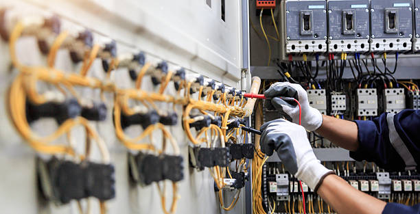 Professional Electrician technician working in Lake Grove, NY
